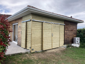 Photo de galerie - Extension garage ossature bois/portes coulissantes