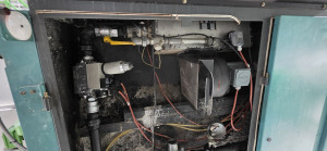 Photo de galerie - Panne d’un brûleur gaz, diagnostique, démontage de l’électrovanne d’alimentation de gaz et nettoyage. (Eau dans le circuit de gaz).