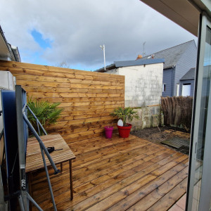 Photo de galerie - Terrasse et panneau bois