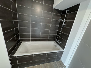 Photo de galerie - Pose baignoire raccordement carrelage et pose mitigeur 