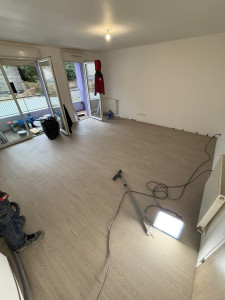 Photo de galerie - Pose de lame PVC collée sur 32m2 