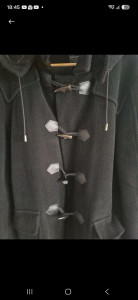 Photo de galerie - Rzmplacement des boutons avec couture à la main pour le cuir.