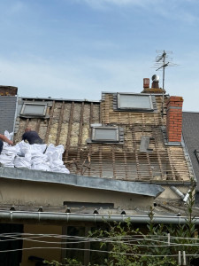 Photo de galerie - Dépose complète de la couverture en ardoise 