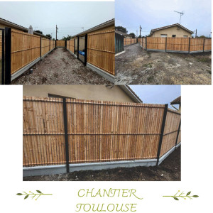 Photo de galerie - Chantier à Toulouse pose de clôture grille rigide avec soubassement et brise vue lames de bois 