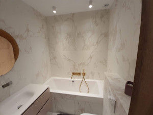 Photo de galerie - Salle de bain avec baignoire 
