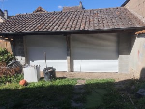 Photo de galerie - Pose de deux porte de garage emroulable motorisation rts 
