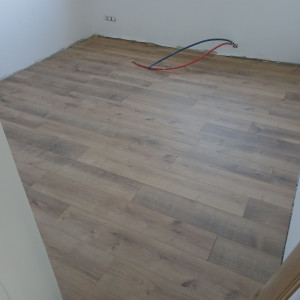 Photo de galerie - Pose de parquet dans une chambre