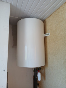 Photo de galerie - Changement d'un chauffe-eau et reprise de la tuyauterie 