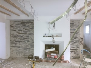 Photo de galerie - Réalisation d’un enduit pierre apparente 