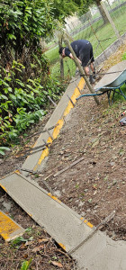 Photo de galerie - Fondation avant installation clôture rigide .