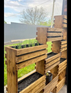 Photo de galerie - Réalisation des jardinières /mur séparation 