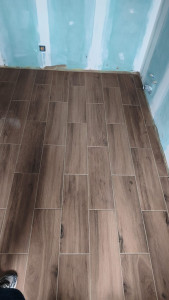 Photo de galerie - Pose du carrelage
