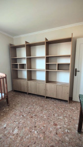 Photo de galerie - Montage et fixation mur d'une bibliothèque 