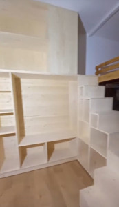 Photo de galerie - Réalisation d'un meuble escalier sur mesure.
