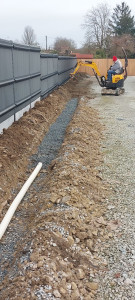 Photo de galerie - Pose d'un drainage dans une allée.