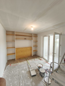 Photo de galerie - Réalisation de travaux d'intérieur avec mise en place d'isolation et création de meuble sur mesure...