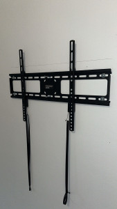 Photo de galerie - Pose de support télé, étagère etc 