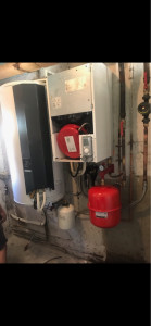 Photo de galerie - Installation d’une pompe à chaleur air/eau ATLANTIC 16Kw et d’un ballon thermodynamique ATLANTIC bi-bloc (2-2)