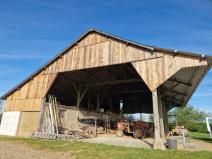 Photo de galerie - Réalisation de bardage en planche de chêne 
