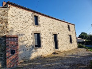 Photo de galerie - Réalisation  d enduit pierre  vue finition sablé 