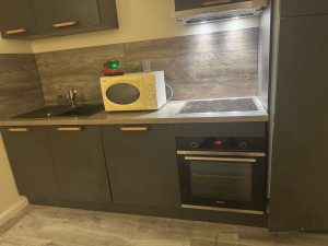 Photo de galerie - Mise en service plaque de cuisson hôte et four 