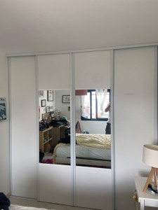 Photo de galerie - Pose et réglage de portes de dressing 