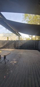 Photo de galerie - Réalisation de pose de bardage extérieur avec assises