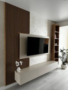 Photo de galerie - Fixer support mural et accrocher la télé aussi le meuble TV et poser les tassons .