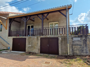 Photo de galerie - Porte de garage battante 