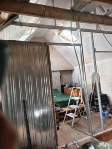 Photo de galerie - Cloison avec une porte coulissante 