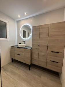Photo de galerie - Pose de meubles dans une salle de bain 