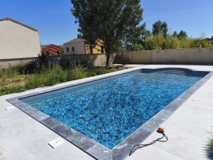 Photo de galerie - Rénovation piscine 
carrelage/margelles 