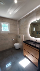 Photo de galerie - Réalisation complète d une salle de bain. Douche à l italienne/WC suspendu/ carrelage sol et mural.