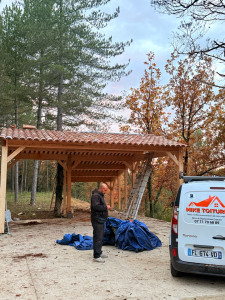 Photo de galerie - Pose d’abri en bois pour Voiture