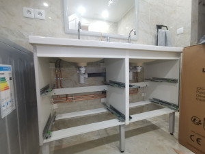 Photo de galerie - Détection d'une fuite d'eau encastré, et réalisation d'un passage en apparent pour EF et EC 