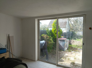 Photo de galerie - Isolation des murs par un placo plus laine de verre 
    enduit plus peinture 