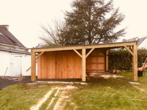 Photo de galerie - Réalisation d’un carport avec abris de jardin