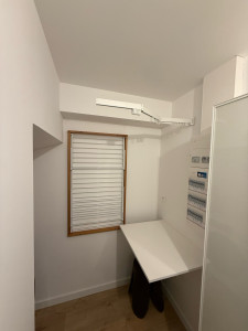 Photo de galerie - Installation au mur de deux séchoirs à linge dans une buanderiew