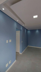 Photo de galerie - Application d'une peinture teintée type velours en 2 couches.