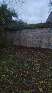 Photo de galerie - Création d'un mur de soutènement en parpaing bancher 