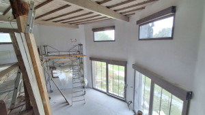 Photo de galerie - Traitement des joints, application d'enduits et application de sous-couche avant peinture. Hauteur de 2,5 à 11m sur 240 m².