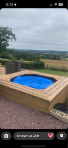 Photo de galerie - -Entourage de jacuzzi en bois .