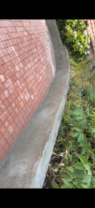 Photo de galerie - Pausse d’un béton fibre sur muret avant d’un enduit de décoration