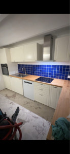 Photo de galerie - Cuisine IKEA avec pose de crédence en faïence après la pose 