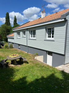 Photo de galerie - Réalisation d'une isolation extérieur avec finition bardage