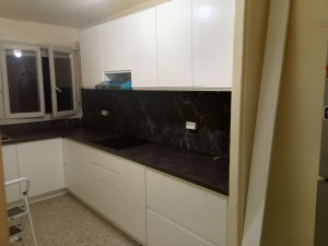 Photo de galerie - Montage des cuisines 