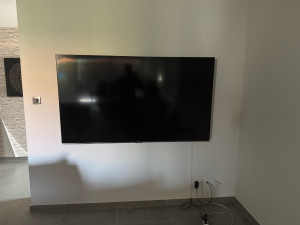 Photo de galerie - Pose de support télé sur un mur placo