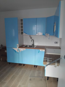 Photo de galerie - Cuisine complète avec plan de travail
