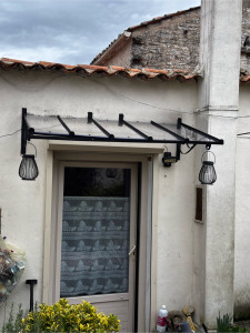 Photo de galerie - Remise en état d’une marquise changement des plexis et peinture