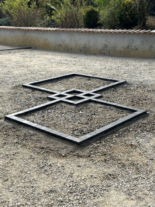 Photo de galerie - Réalisation de motifs en pavés.